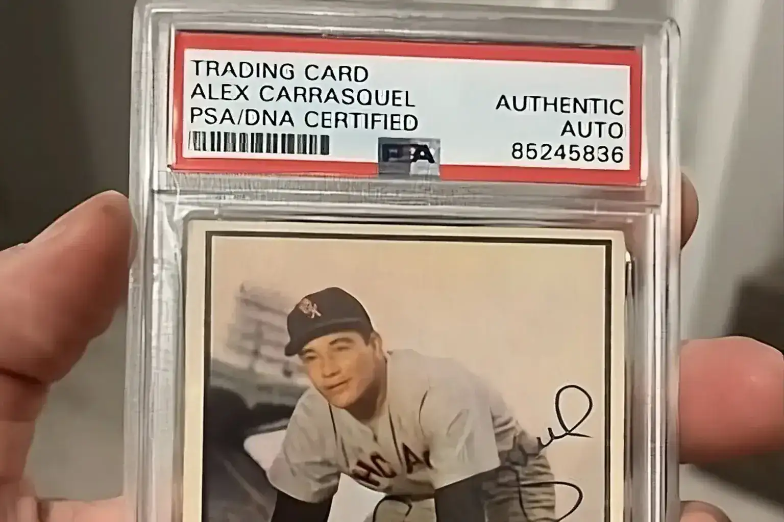 Sell vintage football helmets — PSA/DNA certified autographed Alex Carrasquel vintage baseball card in a graded slab
