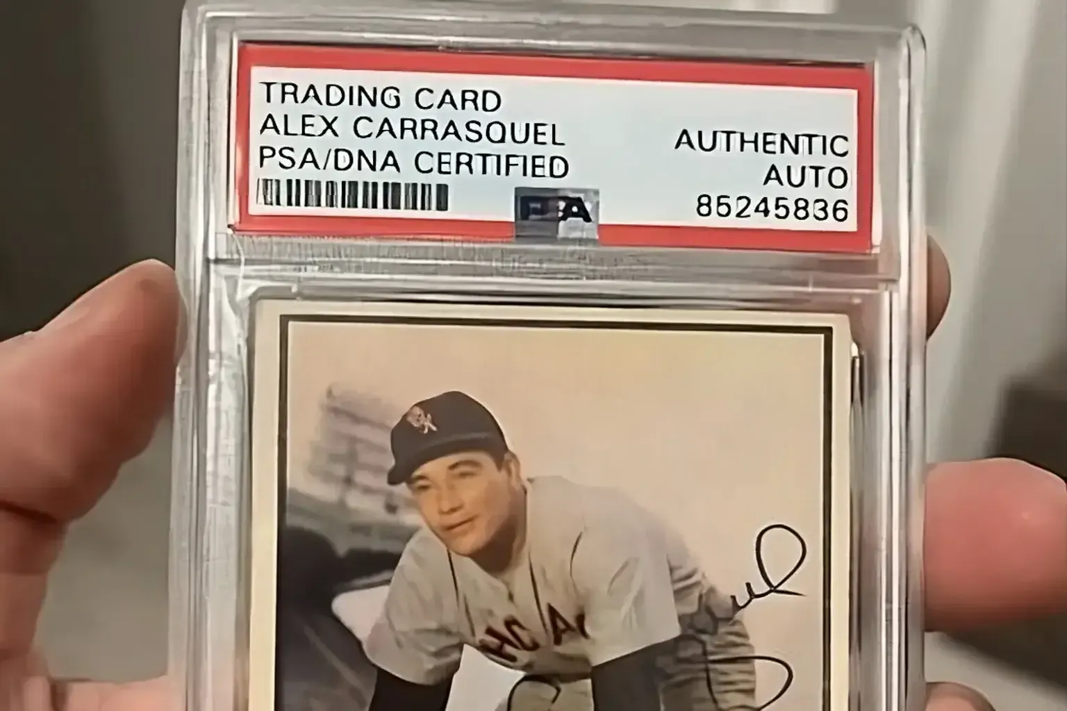 Sell vintage football helmets — PSA/DNA certified autographed Alex Carrasquel vintage baseball card in a graded slab
